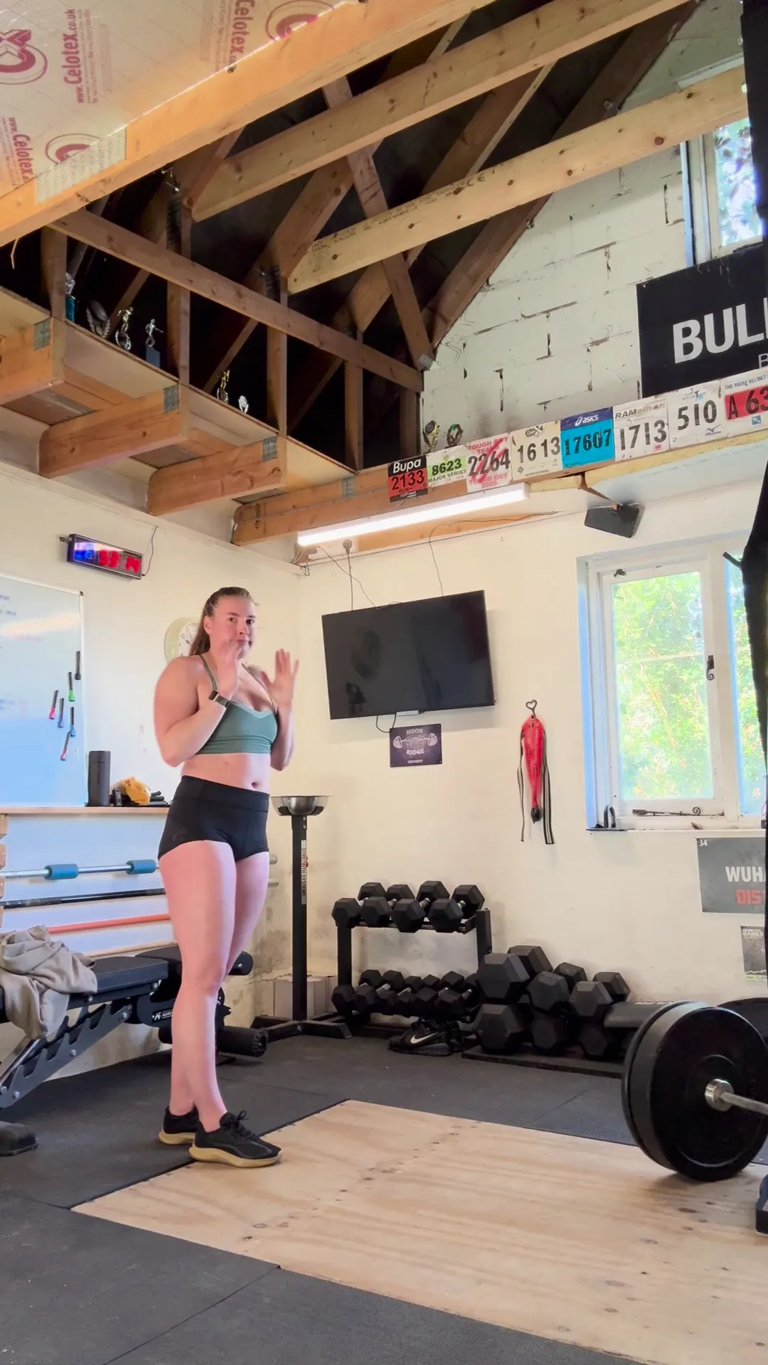 07p02 frame at 00:08, 07p02’s gym dominance begins here: sweat already glistens on her freckled shoulders as she raises a battle-ready hand