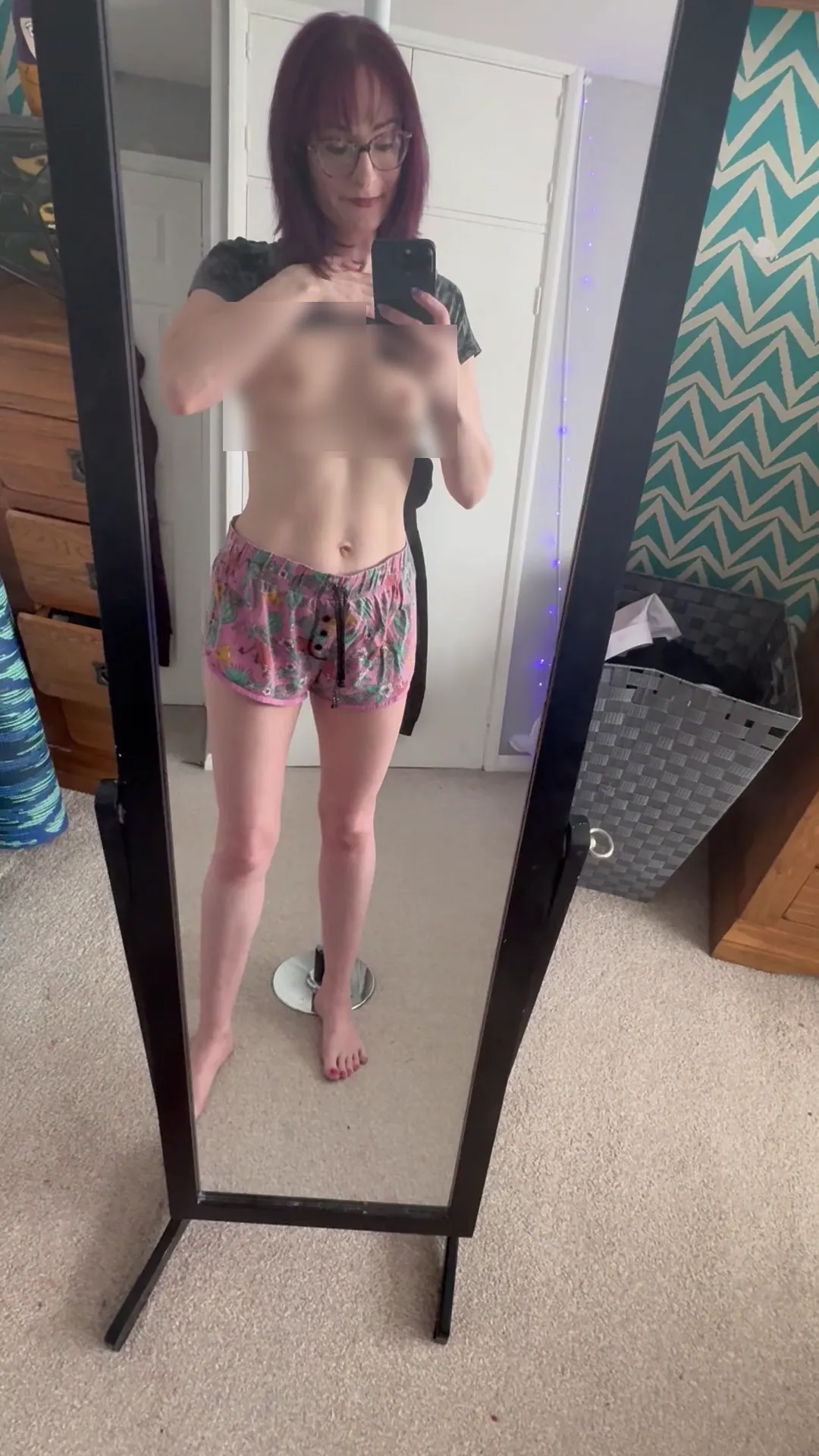 Allalexfeet frame at 00:12, Allalexfeet commands the mirror with her signature scarlet bangs and black-framed glasses, her pale skin glowing like a neon-lit rebellion
