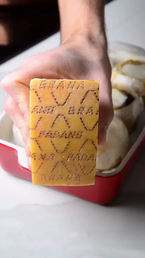 Delicious_Delilah frame at 00:43, Cheese gripped like a treasure map—Delilah’s leather-clad fingers flaunting dairy decadence
