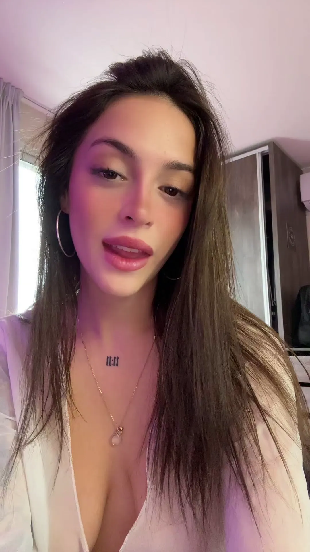 Hot_Bad_626 frame at 00:14, Architect of desire: Eyebrows arched like cathedral doors, 'III' tattoo a holy trinity