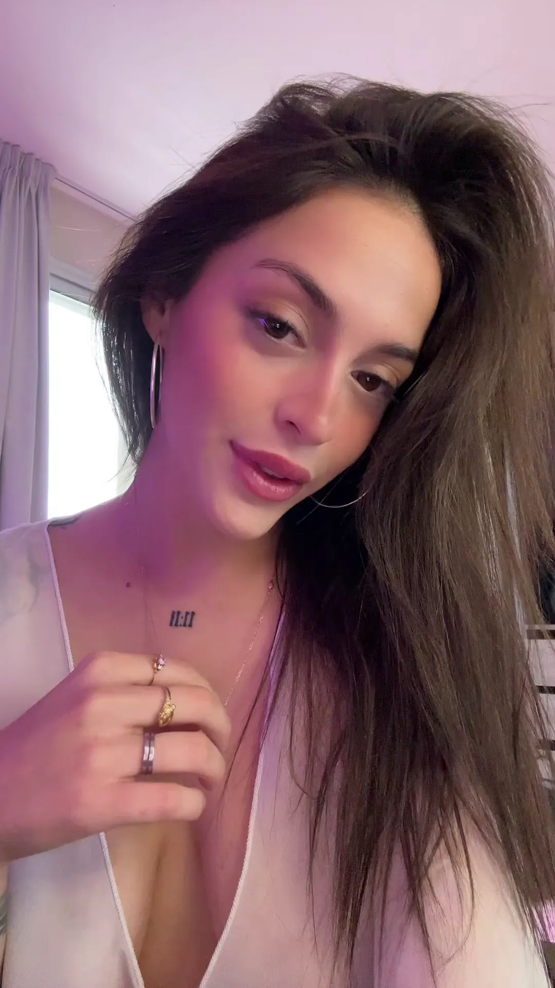 Hot_Bad_626 frame at 00:18, 99 problems but the V ain't one: Collarbone '99' winks as rings glint on her left hand—a silent countdown to what she'll reveal next