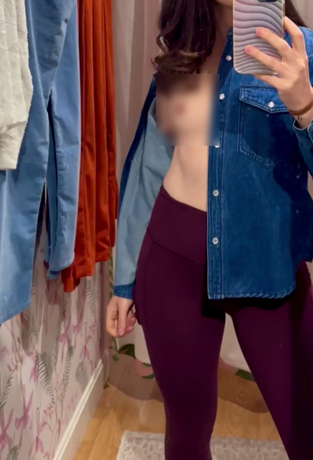 Mrs_Razzle_Dazzle frame at 00:04, Mrs_Razzle_Dazzle’s casual confidence shines here—denim jacket flung open like a dare, maroon leggings hugging her signature peachy curves