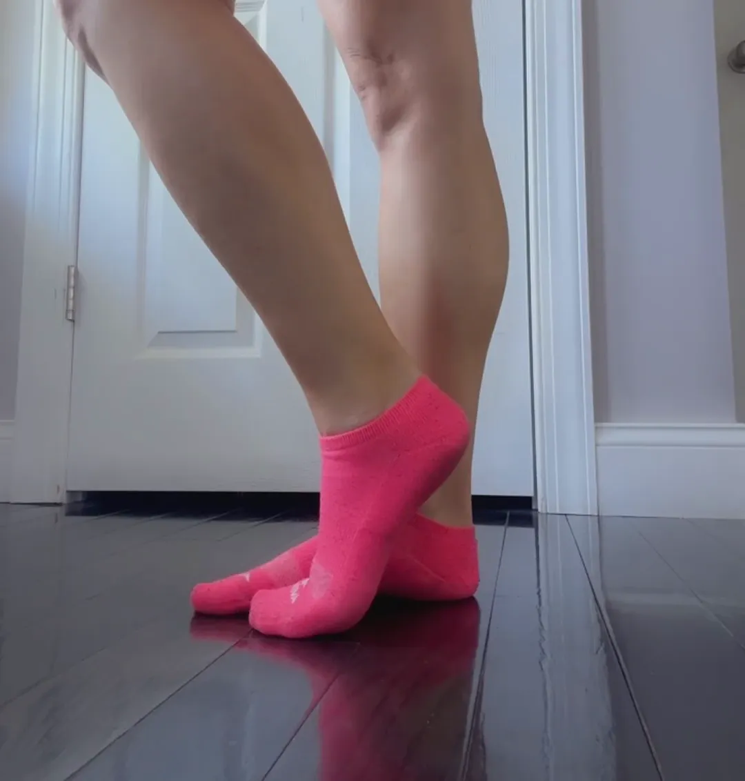 Teachers_fun_secret frame at 00:00, Sunlight caresses pastel-clad legs in rebellious classroom chic, those **animal print socks** peeking like a secret under bright pink fabric